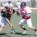 Justin Ahn (Sr., Defense) plays defense against Occidental.